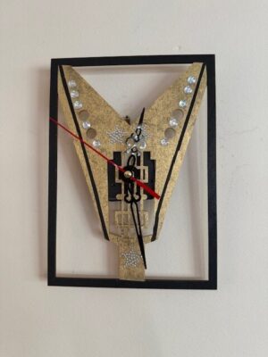 FLYING V GUITAR IN A BLACK PLASTIC FRAME