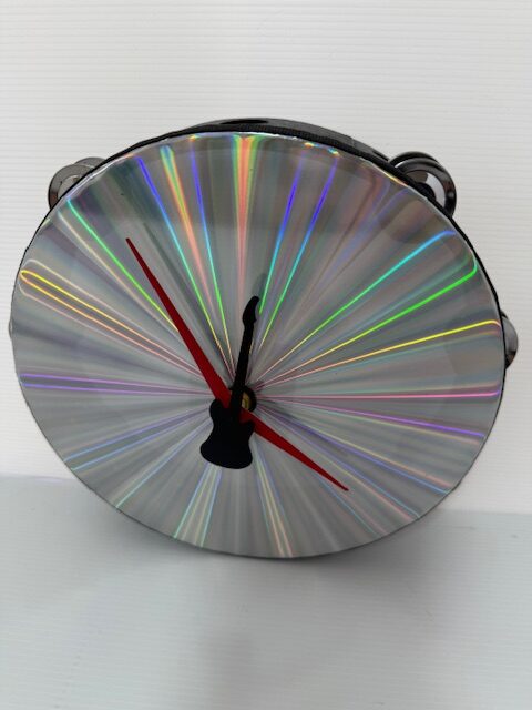 THE  RADIANT TAMBOURINE 12" CLOCK